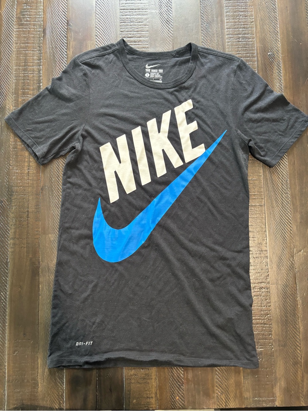 Nike Black Short Sleeve Tee with Blue Swoosh and Cream NIKE Text